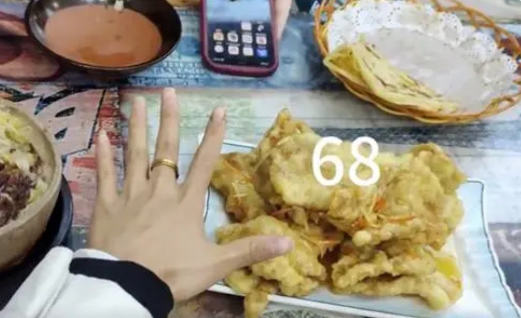 游客吐槽哈尔滨锅包肉13块68元，店家转888元致歉：弄错价格