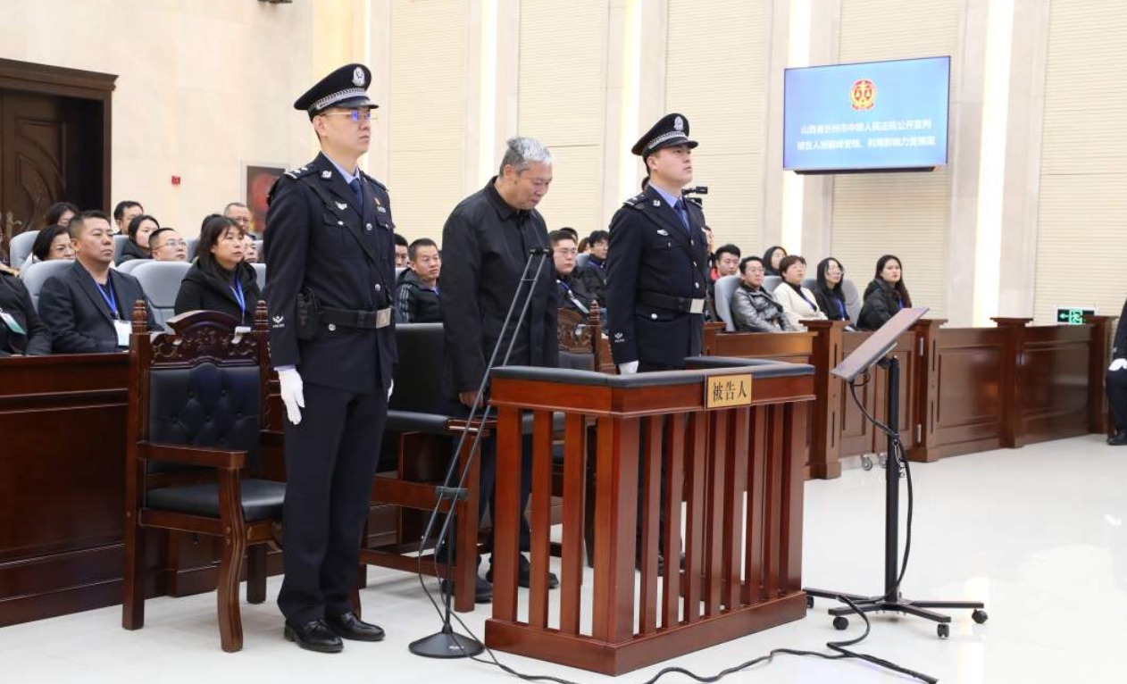 内蒙古高院原院长胡毅峰一审获刑14年