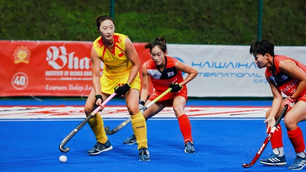 时隔16年再夺亚洲杯冠军 中国女曲直通世界杯