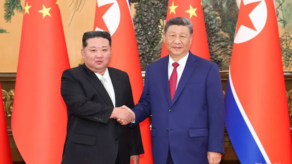 习近平同朝鲜劳动党总书记、国务委员长金正恩举行会谈